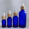Brown Glass Essential Oil Bottle with Bamboo Lid and Dropper for Cosmetics