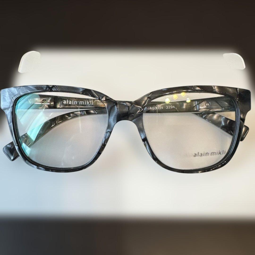 Used alain mikli gray glasses
