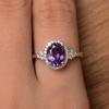 Elegant Oval-shaped Women's Engagement Ring, Elegantly Inlaid with Sparkling and Charming Purple Synthetic Zirconia, Designed As a Luxurious and