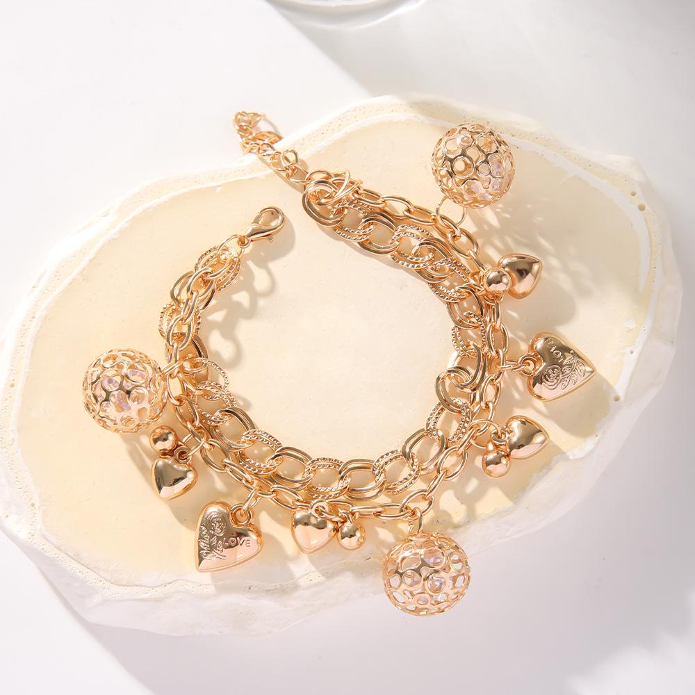 Gold Electroplated Multi-layer Love Pendant Bracelet with Extension Chain