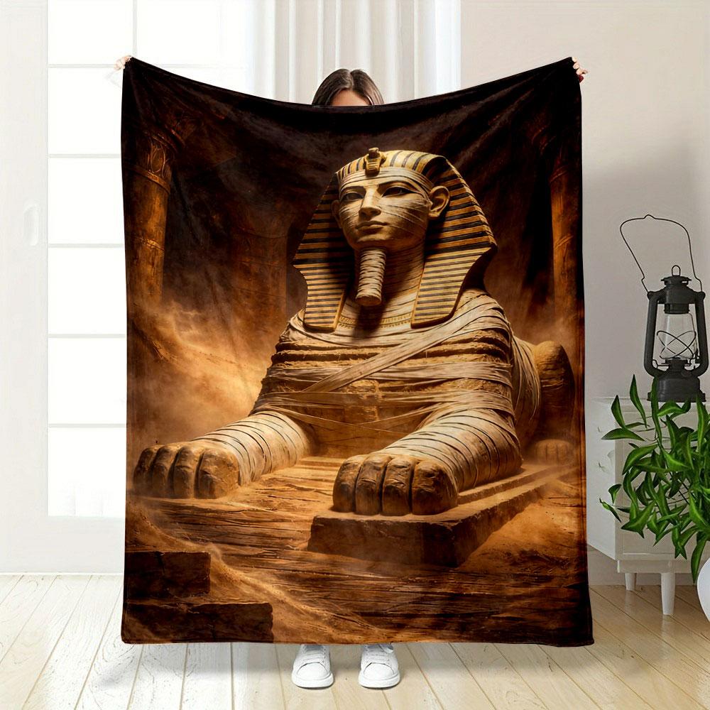 A Statue of a Sphinx Wrapped In Bandages, Set In a Dusty Ancient Scene. for All Seasons Blanket Lunch Break Throw Gift