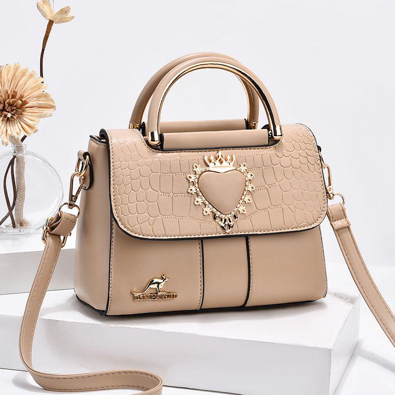 

2024 Women s Embossed Solid Color Versatile Crossbody and Shoulder Handbag