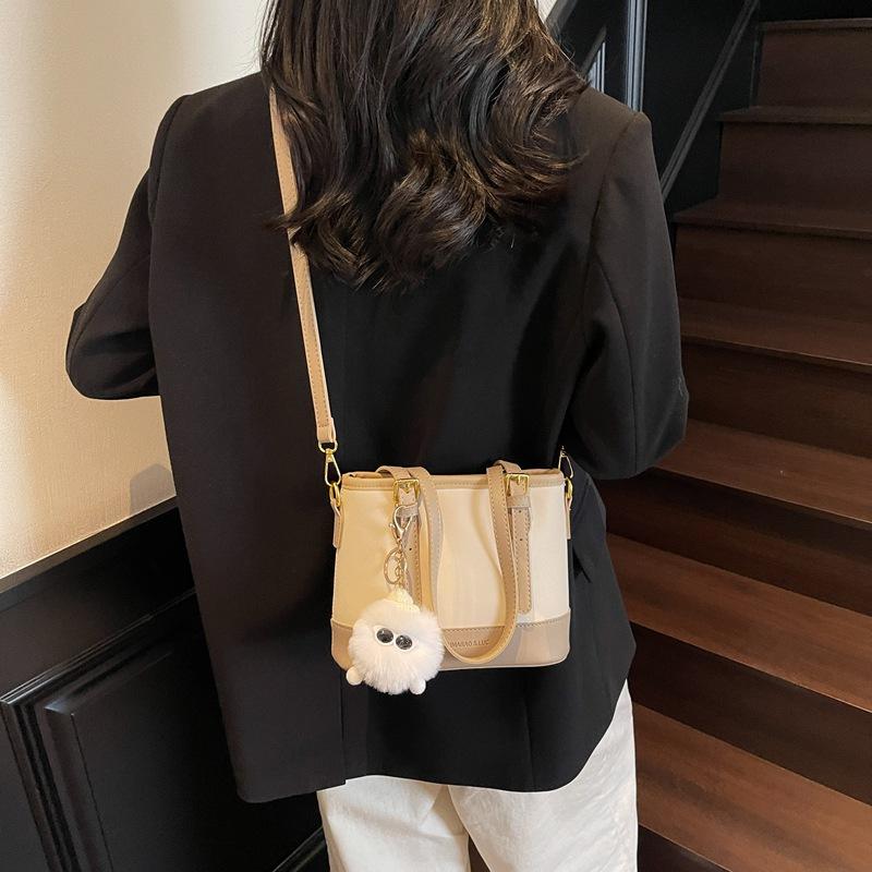 Ny Ensfarget Bærbar Bøtteveske Dame Mote Allsidig Skulder Messenger Bag