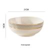 European Style Gold Rim Ceramic Dinnerware Set - Includes Large Bowls, Soup Bowls, Plates, and Rice Bowls for New Year Celebrations.