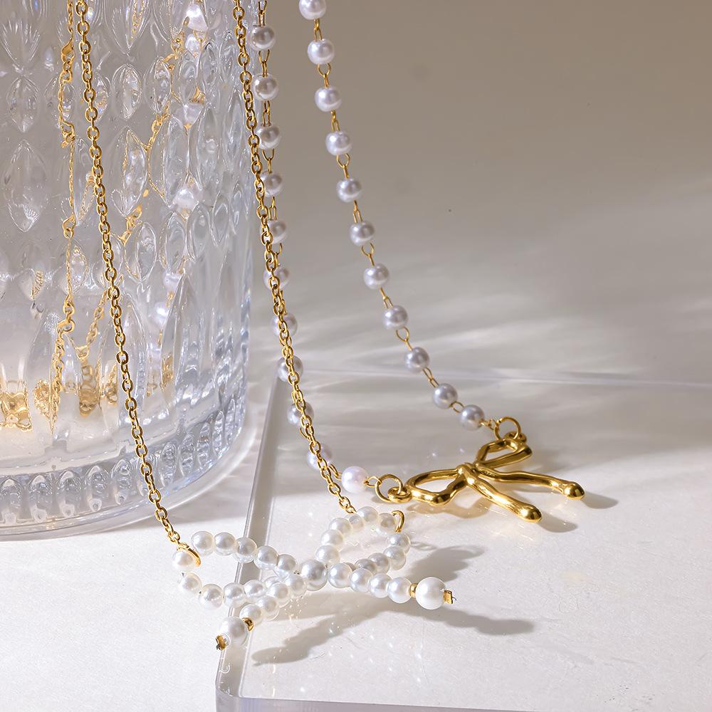 French bow imitation pearl collarbone chain women's stainless steel plated 18k gold necklace does not fade light luxury niche