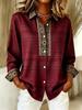 Plus-size women's long-sleeved casual shirt with buttoned lapels, perfect for New Year gifts