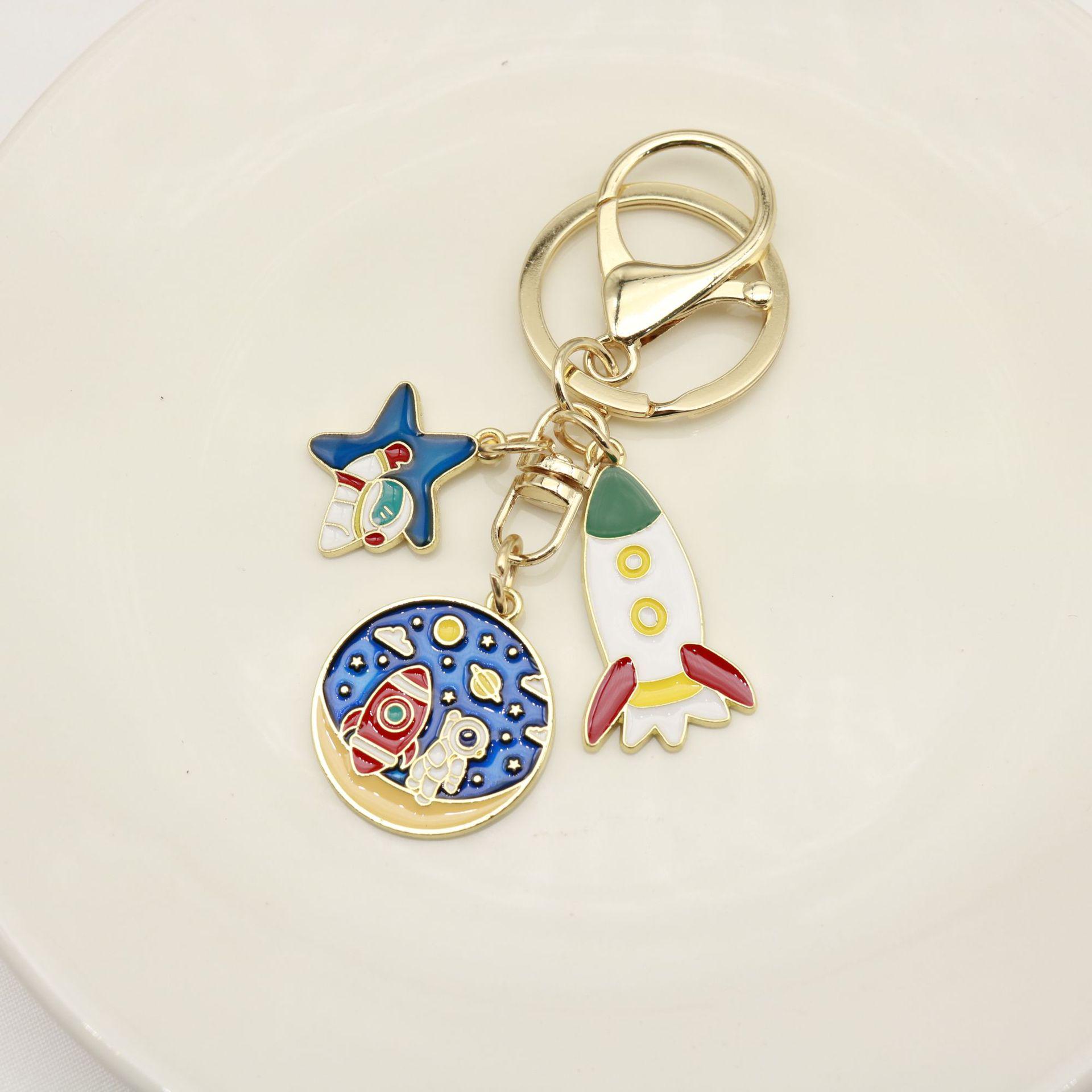 Cute Cartoon Astronaut Keychain – Star Rocket Pendant Gift