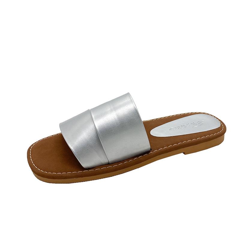 2024 summer new flat-bottomed niche simple one-word cool slippers female soft-soled fairy wind open-toed beach shoes