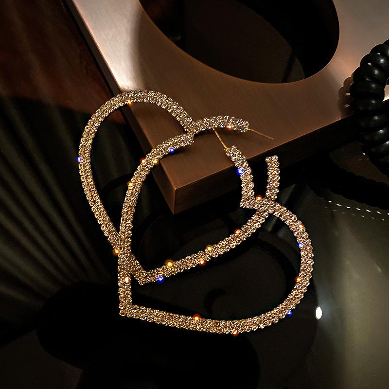 Silver needle retro Hong Kong style dripping oil round earrings niche temperament earrings fashion light luxury summer women's high-end earrings