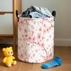 One Large Round Storage Basket Featuring an Adorable Pink Bow And Floral Heart Designs Includes a Sturdy Handle And Offers