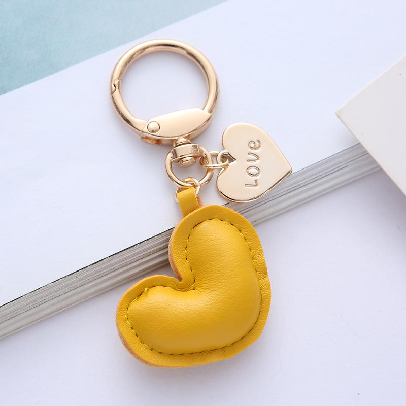 Neuer farbenfroher Leder-Herz-Schlüsselanhänger - Niedliches Legierungspendant-Accessoire