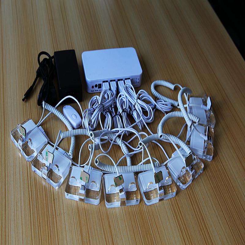 

Multi-Way Mobile Phone Anti-Theft Charging Stand with Alarm 1-to-4 complete set