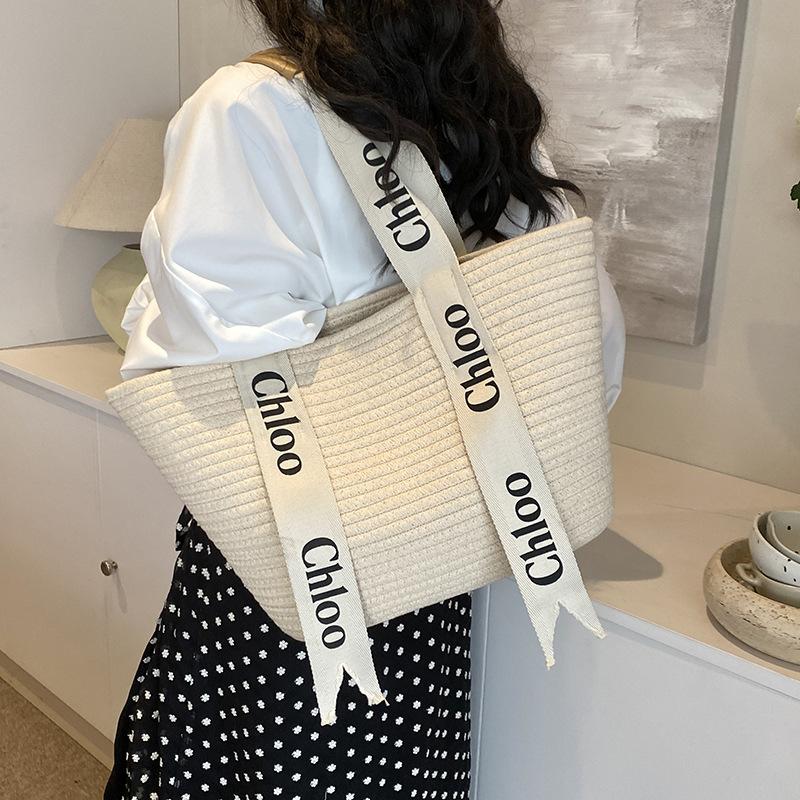 Woven Straw Bag Women's Large Capacity 2025 New Versatile Seaside Shoulder Bag Beach Vacation Commuter Tote Bag