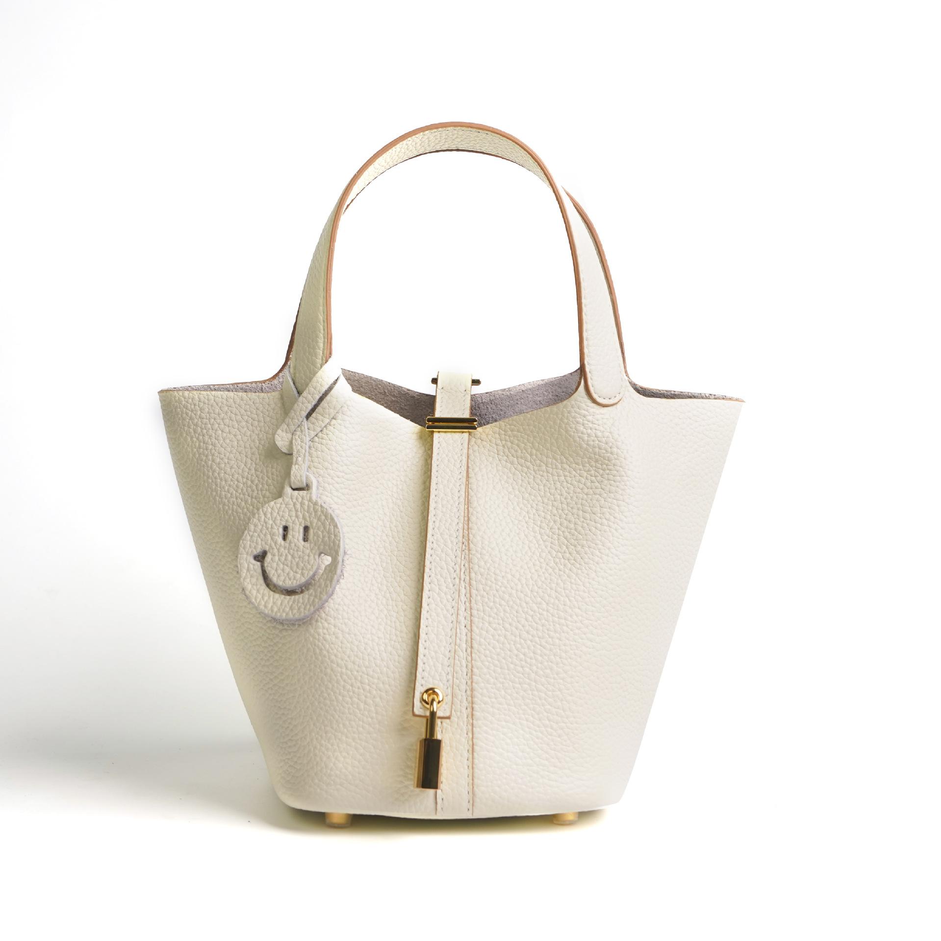 

Сумка 2025 женская из первого слоя коровьей кожи, сумка-овощная корзина, универсальная сумка-ведро, женская сумка из натуральной кожи, высококлассная сумочка Length 18cm * Width 13cm * Height 18cm