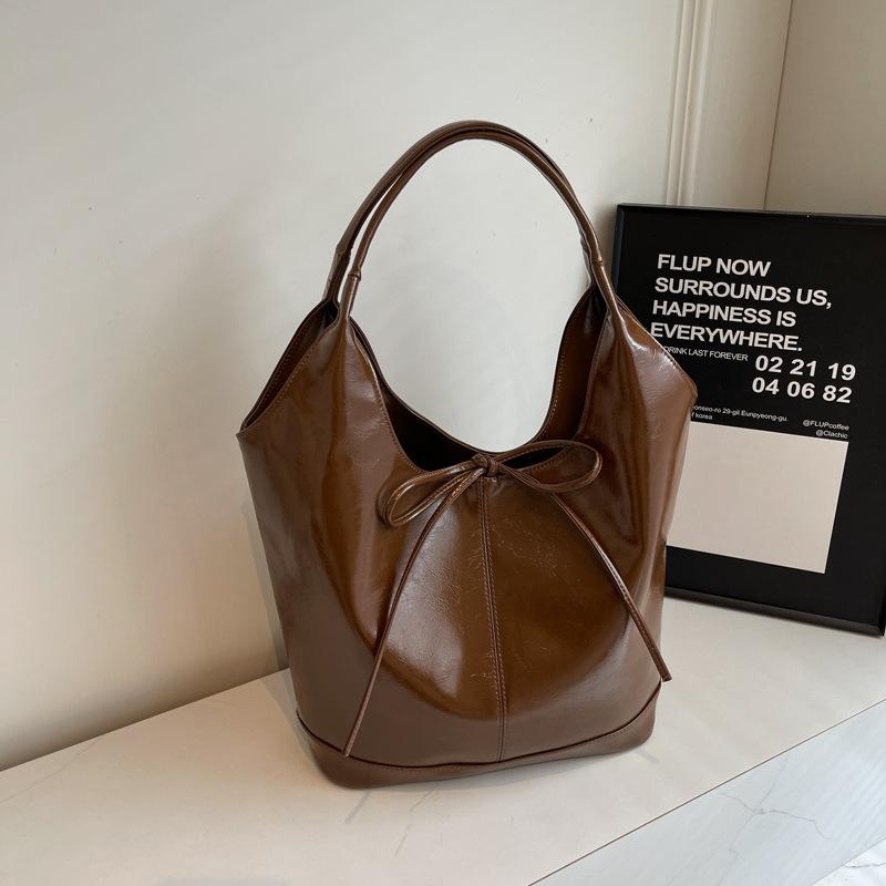 

2024 новий модний елітний літній рюкзак Sen Meng, популярний на плечі, повсякденний нішевий дизайн, корейська проста жіноча сумка 41*13*27 коричневий