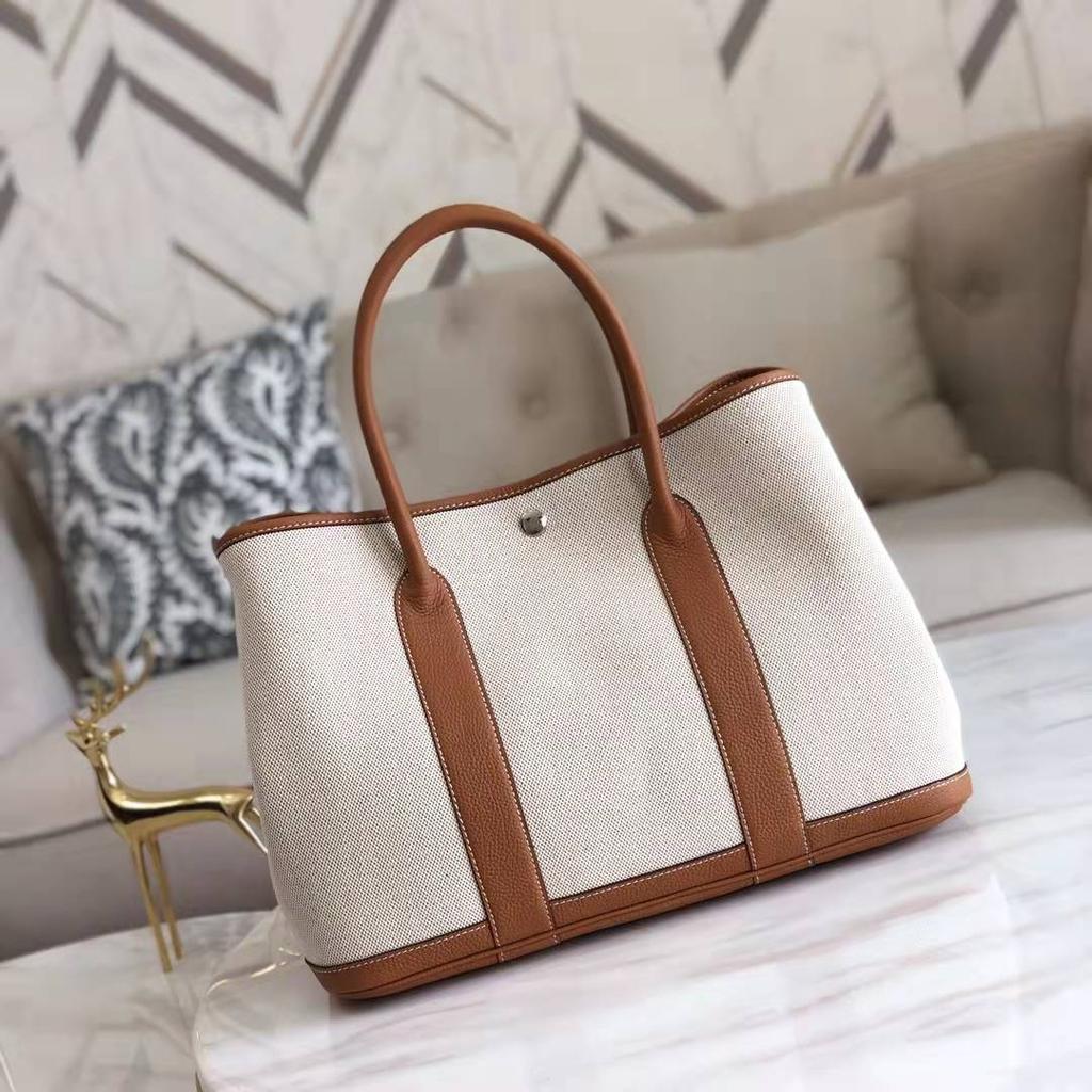 Grensoverschrijdende nieuwe canvas tas met eerste laag koeienhuid voor dames, tuin handtas, echt leer, contrasterende kleur, schoudertas, messenger tas, tote bag