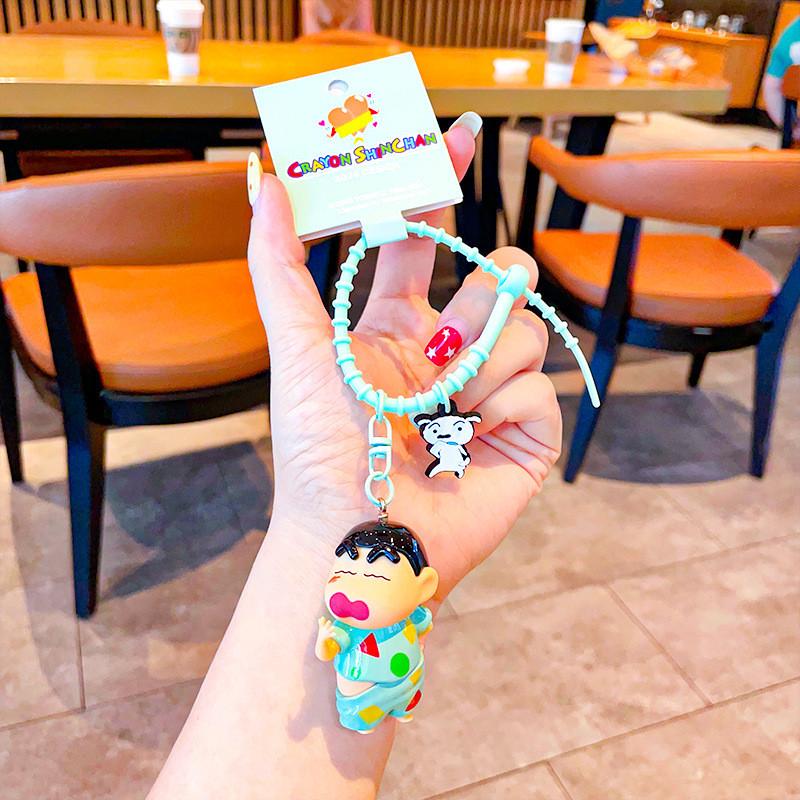

Delightful Cartoon Character Keychain Collection Featuring Crayon Designs Shinchan Pajama Butt
