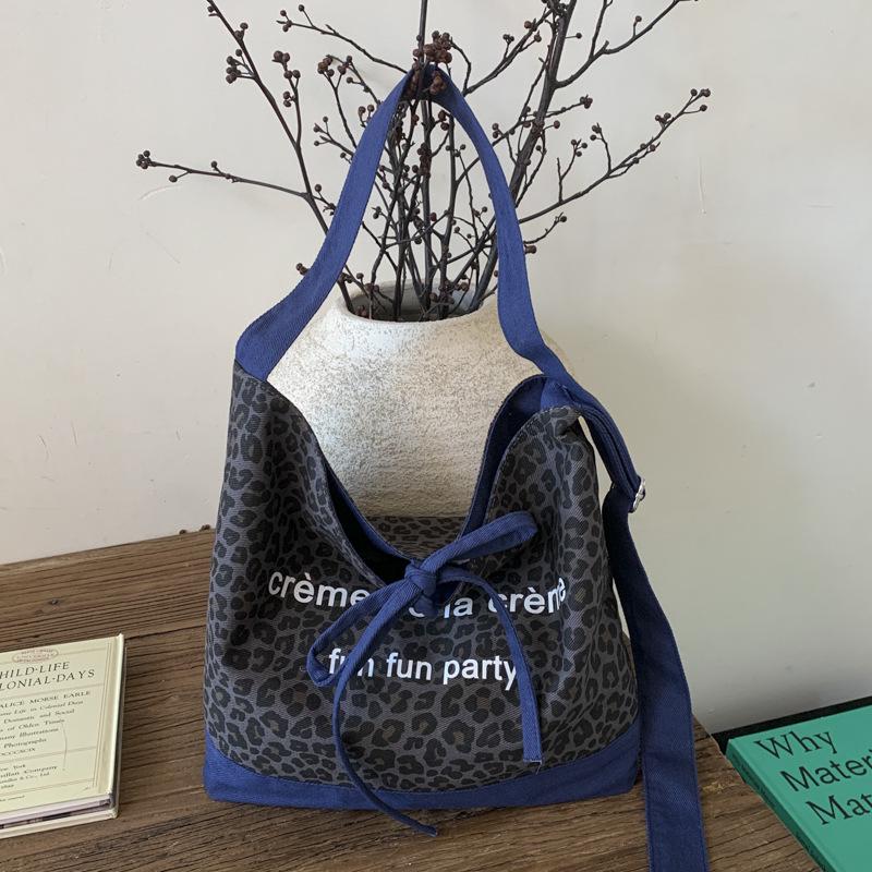 

Women s 2025 Stylish Large Capacity Double-sided Tote & Crossbody Bag