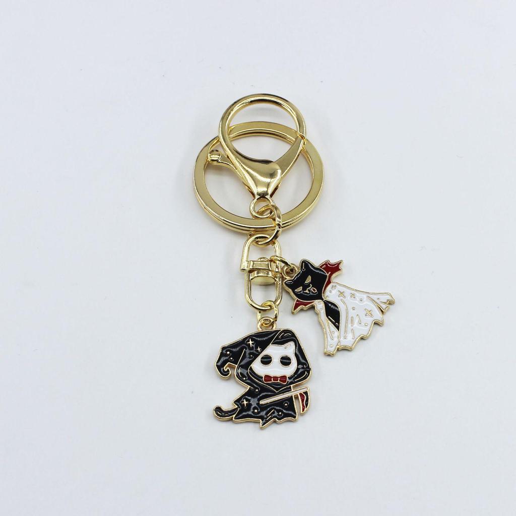 Halloween Cat & Bat Keychain with Wizard Hat, Drip Oil Skull, and Pumpkin Bag Pendant - Alloy Accessories.