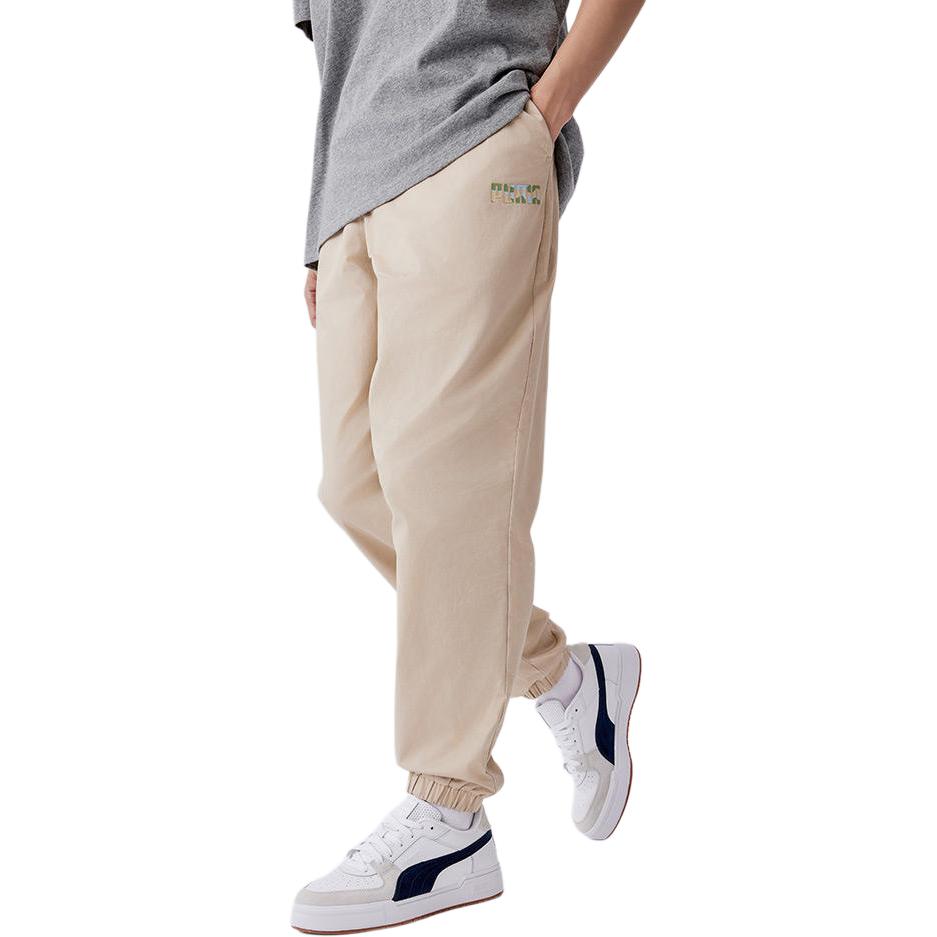 Puma Pantalon de sport tricoté fuselé mi-haut à lacets avec imprimé logo Homme bas Avoine 683303-88