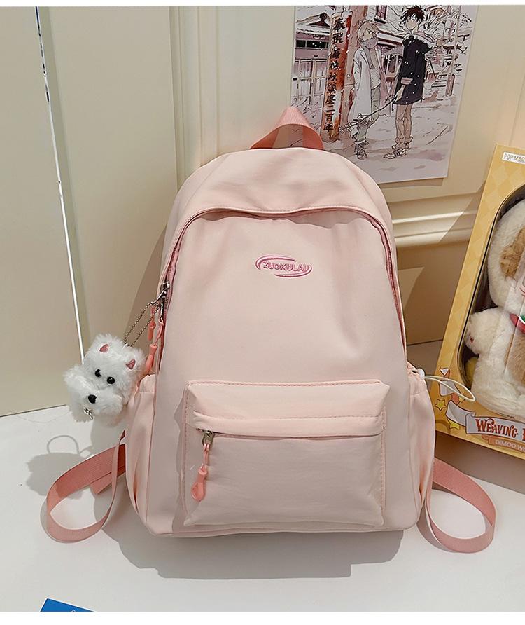 School bag 2025 new solid color ins wind backpack Korean version versatile high-value backpack simple large-capacity student school bag