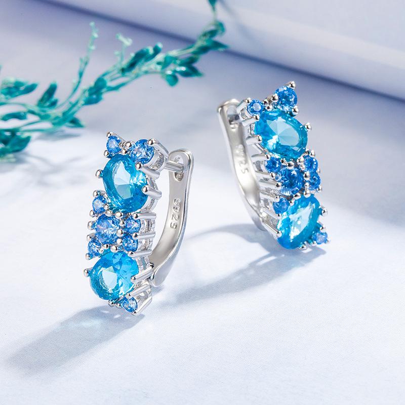 2026 Diamond-encrusted Sea Blue Zircon Earrings Women's European and American Temperament Light Luxury Sea Blue Zircon Earrings Ear Buckle Jewelry