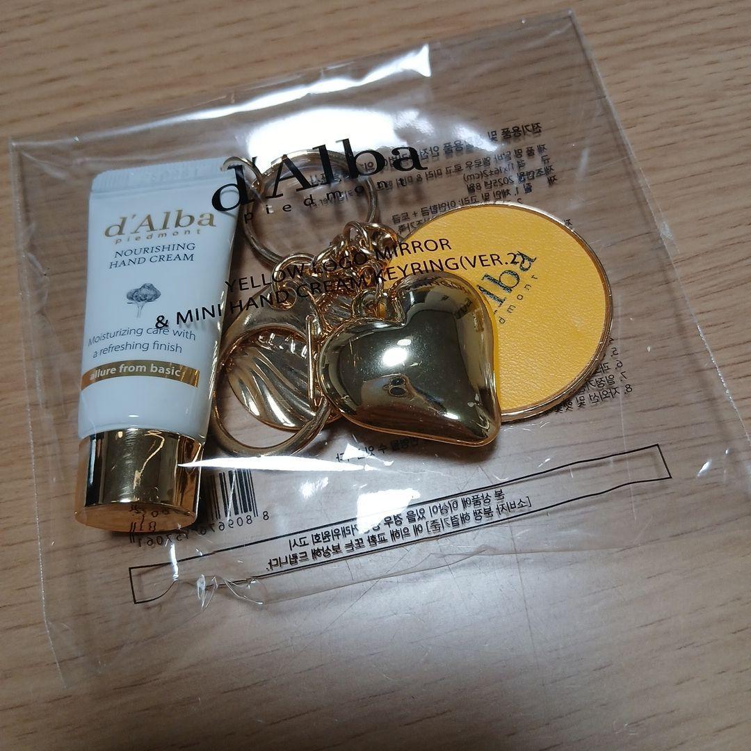 d Alba mini hand cream and keychain with mirror