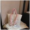 New simple contrasting color portable cotton clothing bag niche personality glossy large capacity shoulder bag