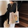 Fashion tote big bag 2025 spring new woven hollow mesh pocket casual cartoon fresh shoulder bag bag
