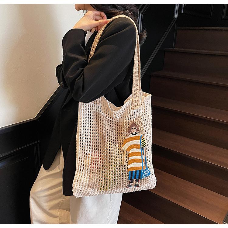 Fashion tote big bag 2025 spring new woven hollow mesh pocket casual cartoon fresh shoulder bag bag