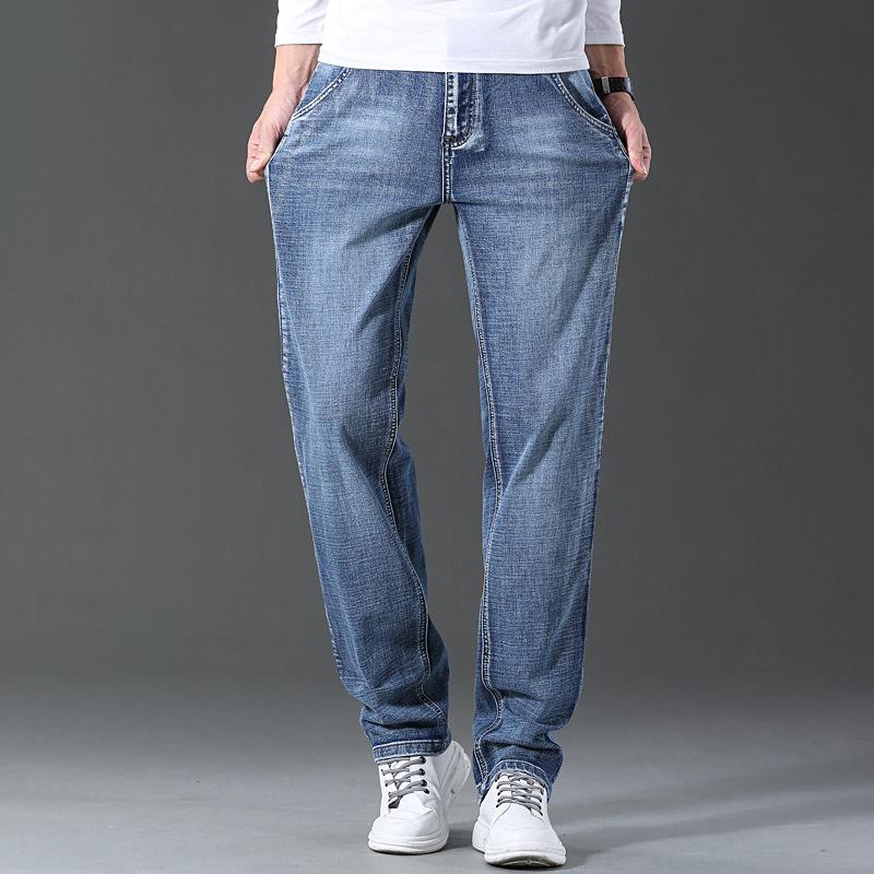 Men's jeans straight leg loose trendy youth pants men's business elastic youth four-season trousers