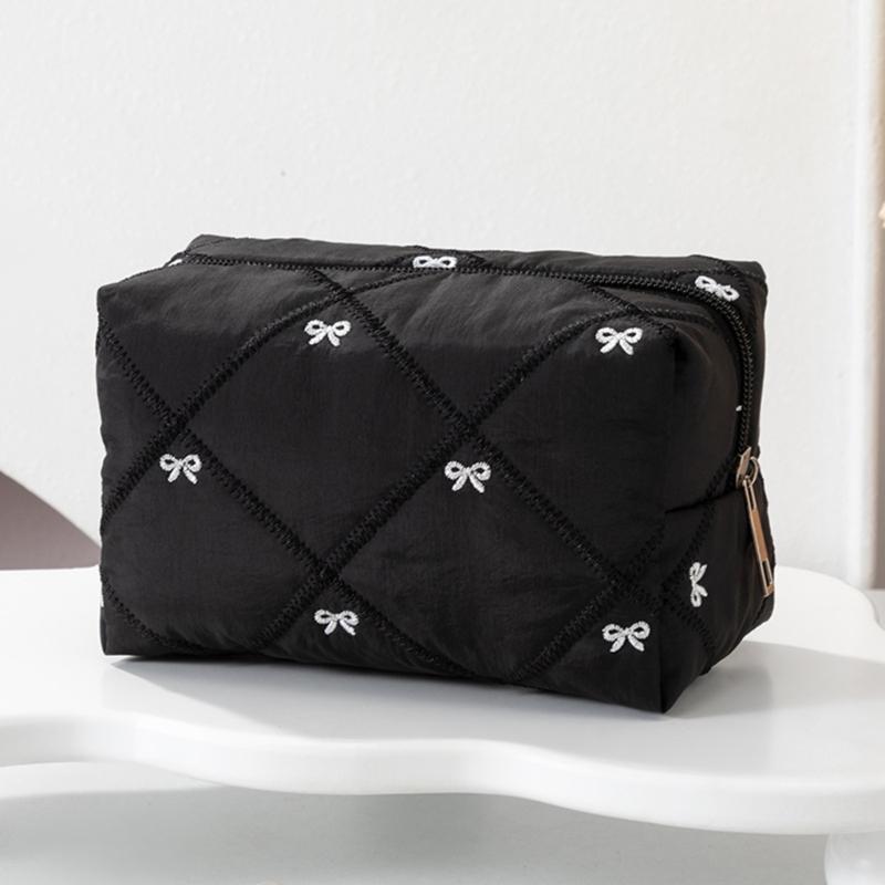 Large Capacity Makeup Organizers with Quilted Bowknot Accent and Multiple Divisions for Efficient Travel