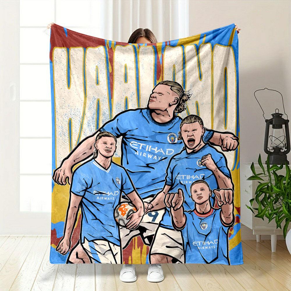 Group of athletes in blue jerseys with bold text and vibrant backdrop. for all seasons blanket lunch break throw gift
