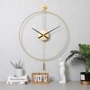 Spanish Light Luxury Simple Wall Clock: Creative Iron Ring Design with Fashionable Swing Feature for Home Decor.