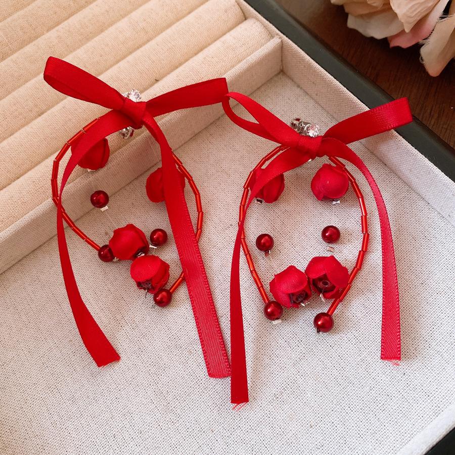 

Vintage vibe red ribbon flower fringed pearl ear clips women s pierless earrings design earrings