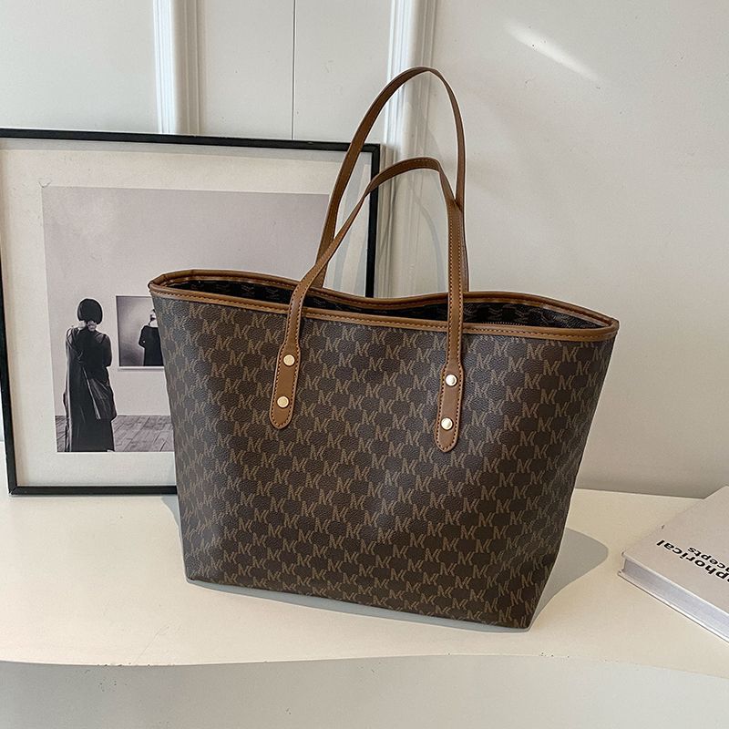 

Сумка премиум-класса женская большая сумка-тоут 2025 новая сумка для поездок на работу универсальная большая сумка женская сумка на плечо