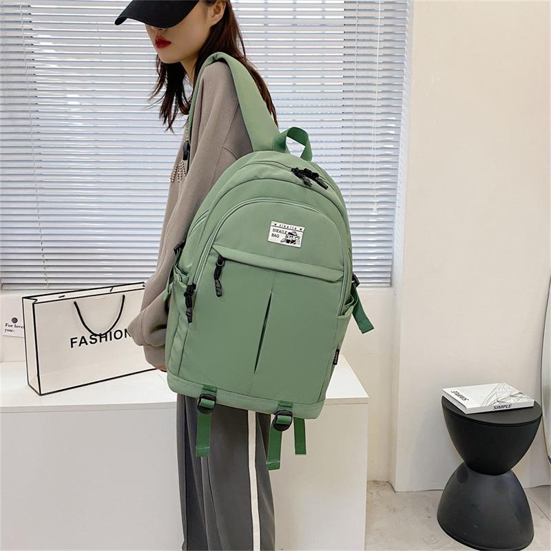 Modny plecak w stylu koreańskim z casualowym napisem