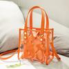 Women's Bag 2023 new niche design Laser transparent Jelly bag Portable commuter Tote bag length 21.5cm high 21.5cm wide 13cm