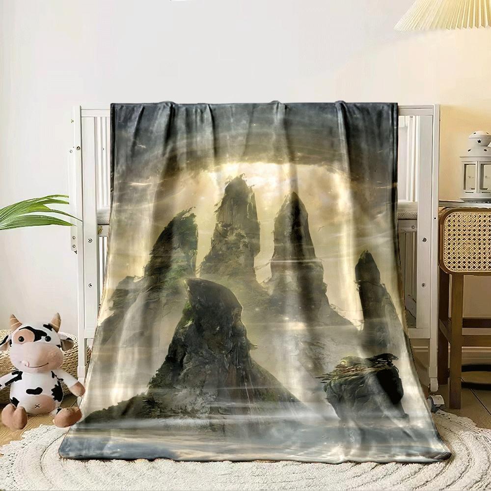 Towering rock formations bathed in golden sunlight amidst swirling mist. for all seasons blanket lunch break throw gift 80cm x 120cm