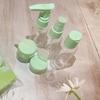 7pcs/set Travel Bottles Spray Bottle Lotion Empty Shampoo Bottle Mini Face Cream Pot Transparent Container Travel Essentials