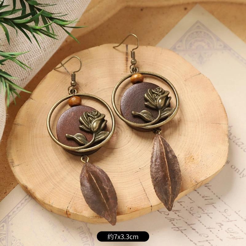 Retro niche literary earrings, natural plant fruits, wooden dried fruits, long fringed women's earrings