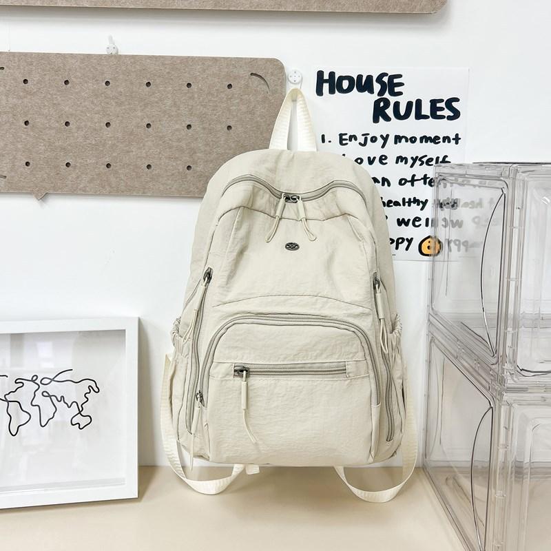 Lightweight schoolbag female solid color water-proof multi-pocket computer commuting backpack college student class travel backpack