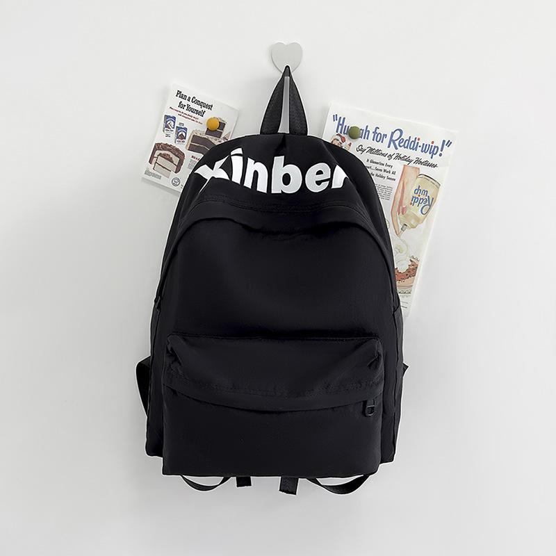 

Simple men s and women s backpacks are strong and durable, junior high school students large-capacity campus letter backpacks чорний