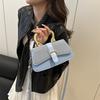 Fresh splicing belt decoration 2025 new women's texture large capacity metal portable crossbody shoulder armpit bag