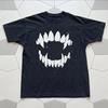 Black T-shirt with White Graphic of a Smiling Mouth with Sharp Teeth