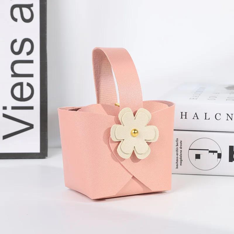

20pcs DIY Portable Candy Box Red Pink Blue Handbag Creative with Flower Leather Baby Bathing Party Gift Packaging Box Wholesale 20pcs&9x6x16cm рожевий