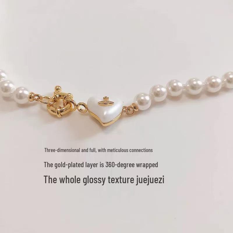 

Elegant Empress Pearl Heart Necklace: French Retro Resin Peach Clavicle Chain
