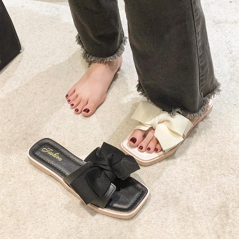 Bow slippers women's summer wear new fashion home flat bottom non-slip fairy wind one-word sandals soft bottom