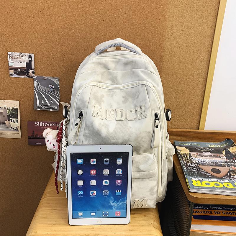 Schoolbag spine protection, lightweight schoolbag for boys, junior high school students, high school students, new large-capacity backpack for women