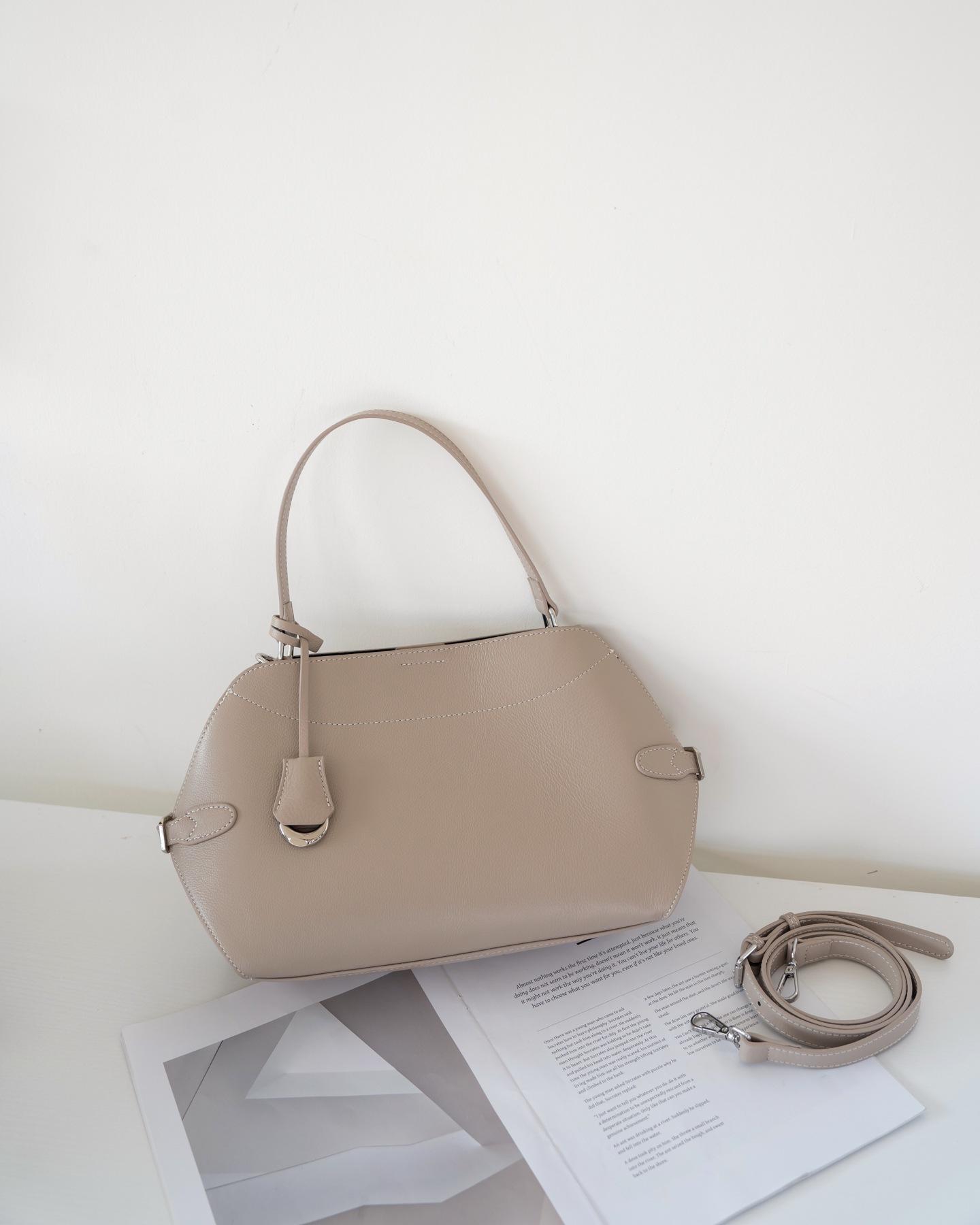 

Leather Women S Bags, Early Spring Women S Versatile Handbags, Women S Niche High-End Sense, Single Shoulder Crossbody Tote Bag Tide 27*21*11CM абрикосовый света